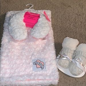 Baby booties, blanket, and pillow